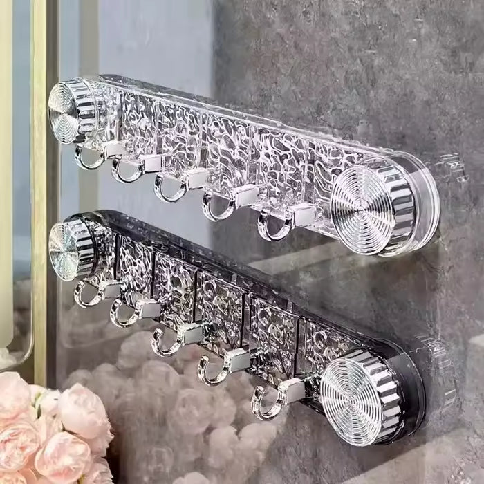 A Wall Mounted Suction Hook Holder is Fixed on a Wall.