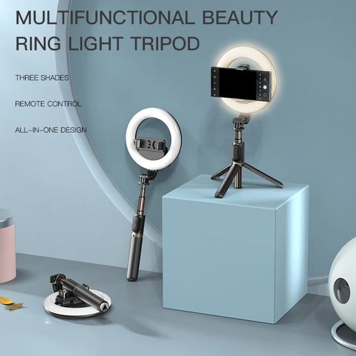 A Mobile Phone is Fixed On a YESIDO Selfie Stick With Wireless Ring Light.