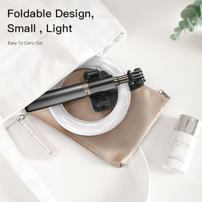 YESIDO Selfie Stick With Wireless Ring Light Tripod is Folded and Placed in a Bag.